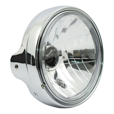 LTD style 7" H4 headlamp. side mount. Clear lens. Chrome